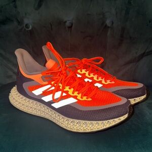 Adidas Black and Orange Athletic Shoes with Breathable Upper